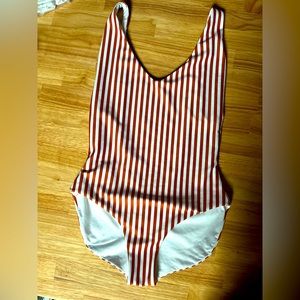 Rust and white striped Minimalist Londre swim suit. Never worn.